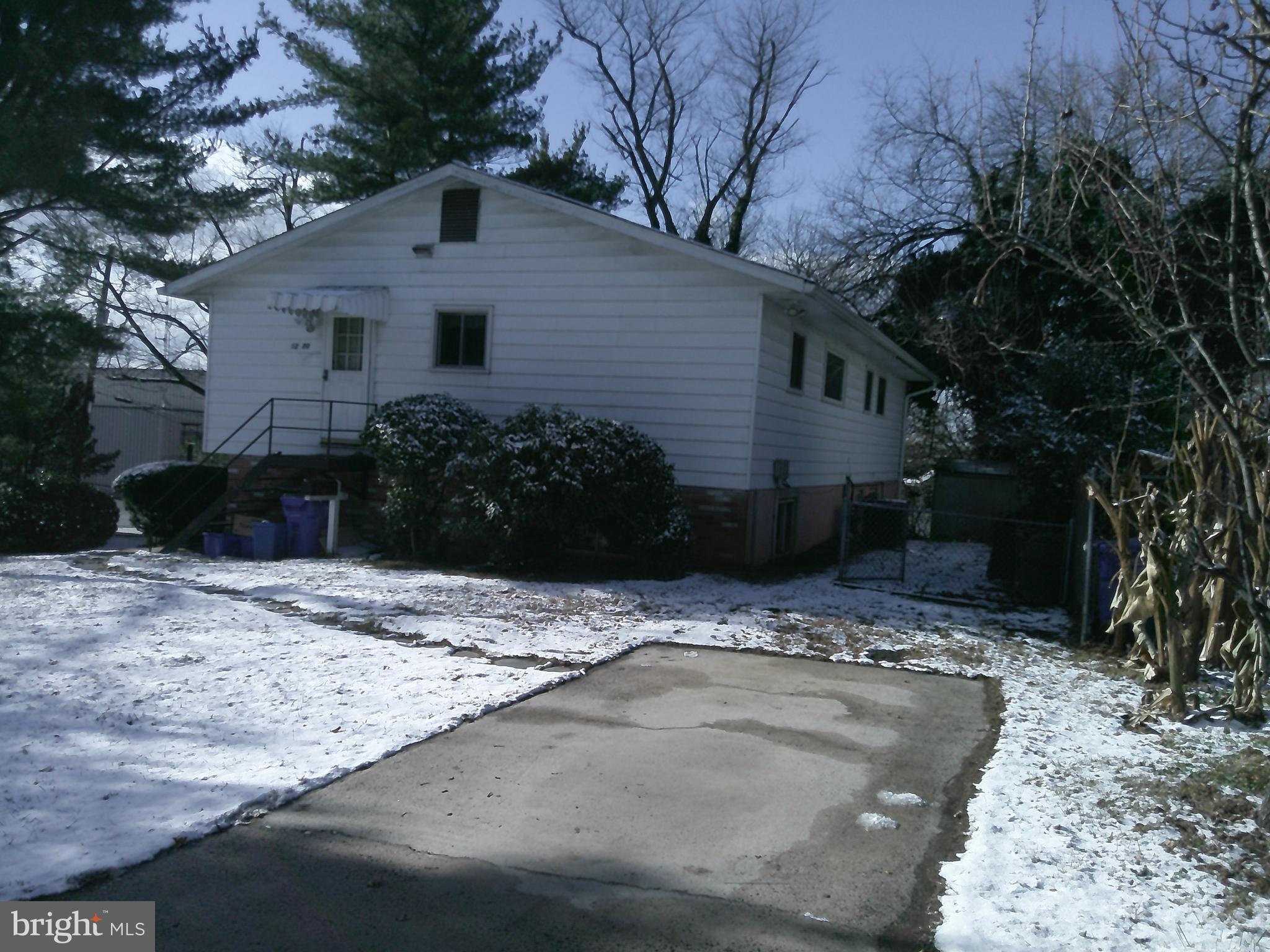 12300 Downer Drive Silver Spring, MD 20906 - Photo 2 of 53 a view of a house with a yard