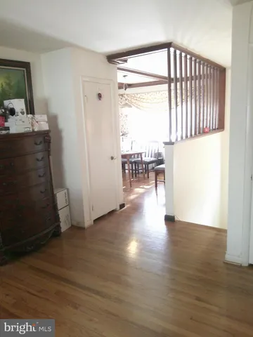 a kitchen with stainless steel appliances kitchen island granite countertop a refrigerator and a stove