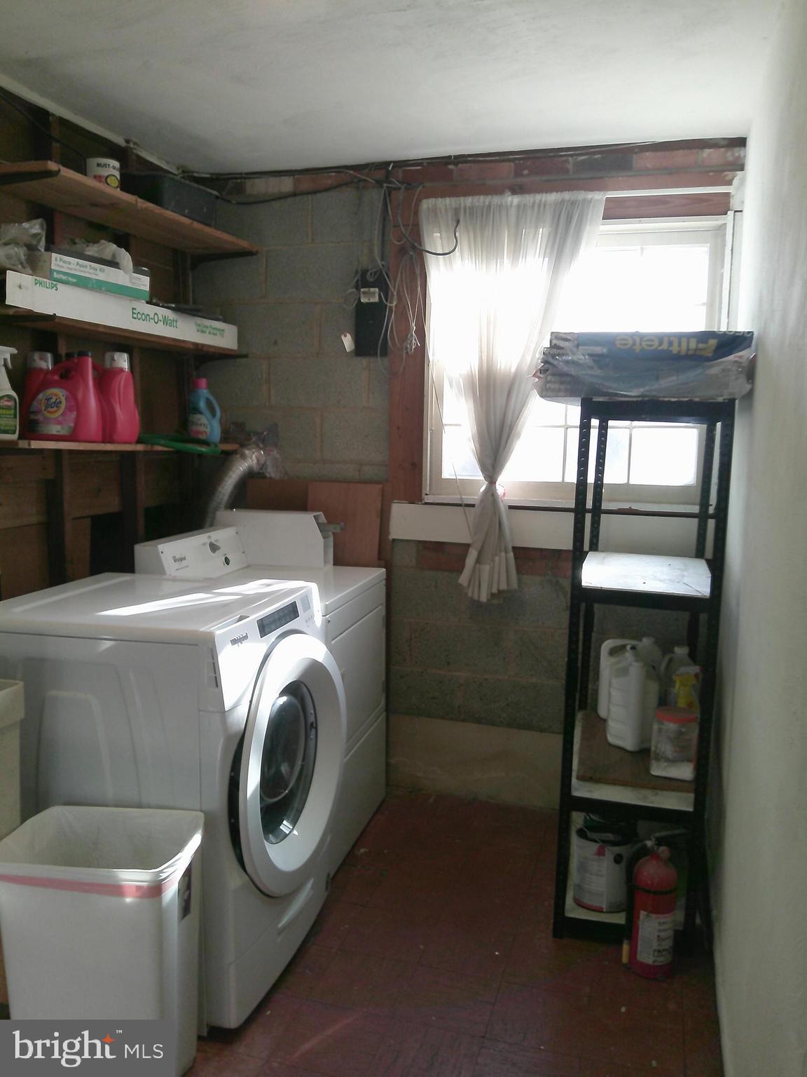 12300 Downer Drive Silver Spring, MD 20906 - Photo 39 of 53 a utility room with dryer and washer