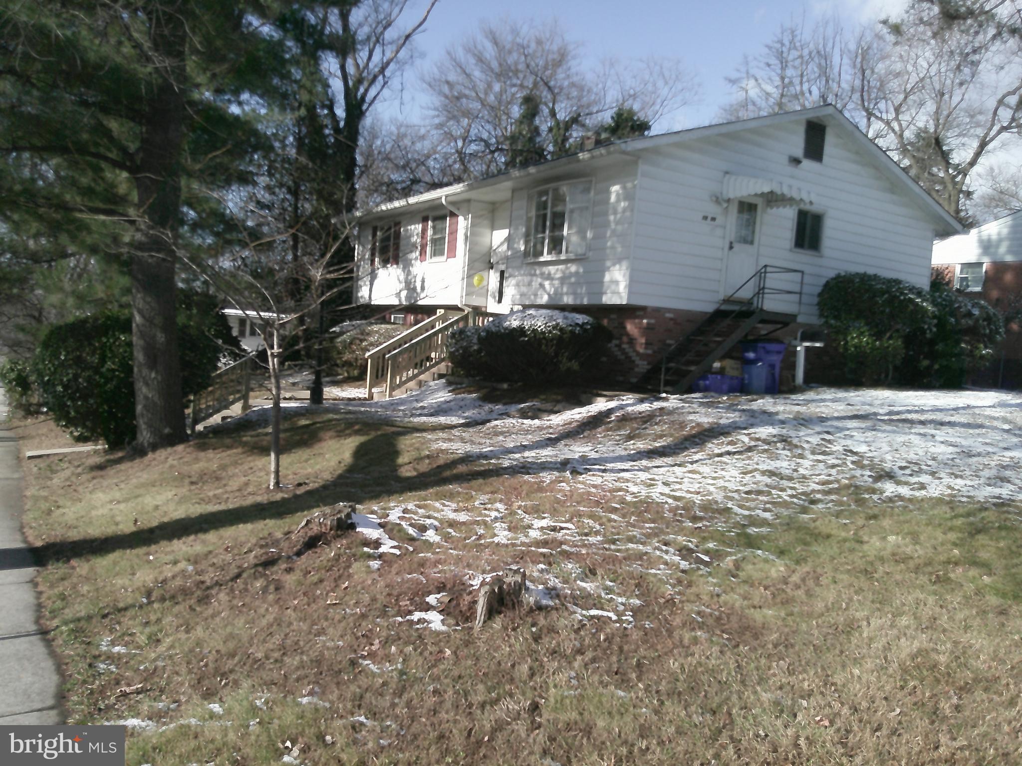 12300 Downer Drive Silver Spring, MD 20906 - Photo 4 of 53 a view of a house with a yard