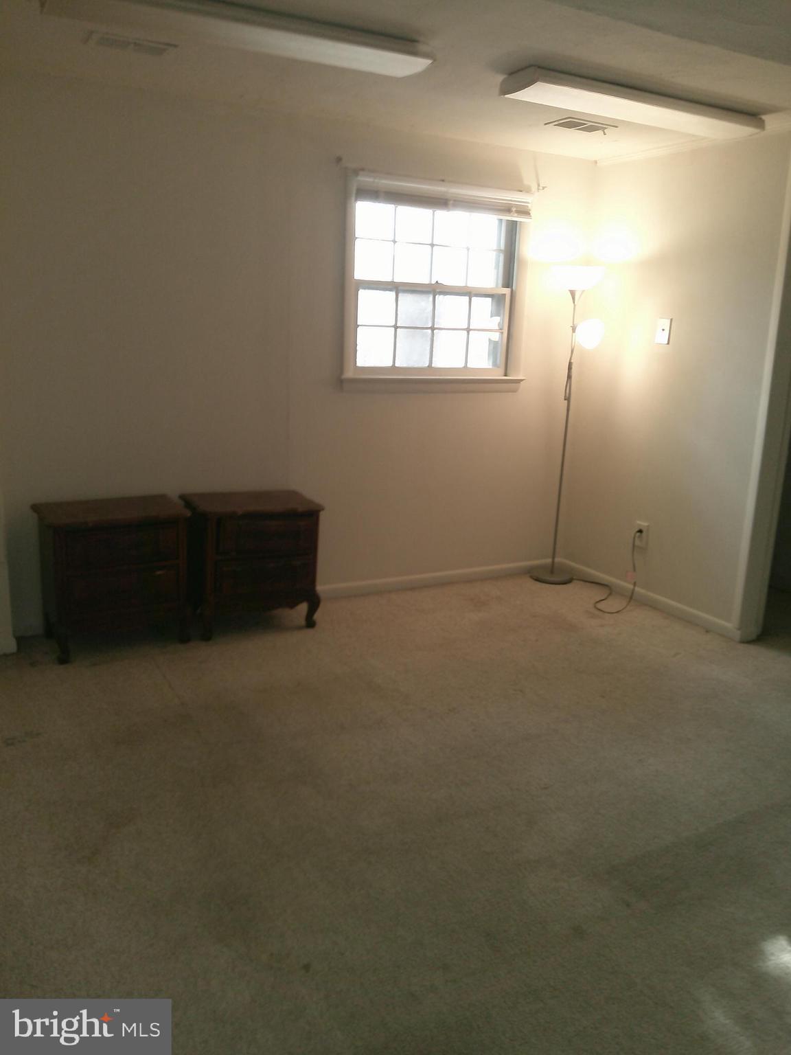 12300 Downer Drive Silver Spring, MD 20906 - Photo 42 of 53 an empty room with windows