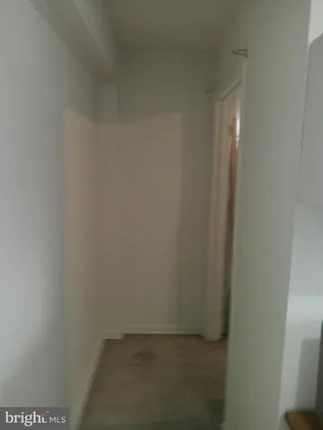 a bathroom with a toilet a sink and a window