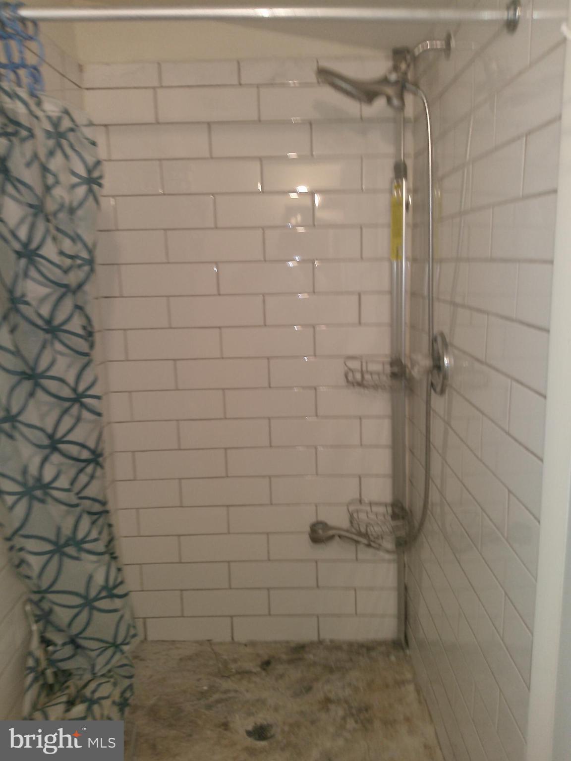 12300 Downer Drive Silver Spring, MD 20906 - Photo 51 of 53 a bathroom with a shower