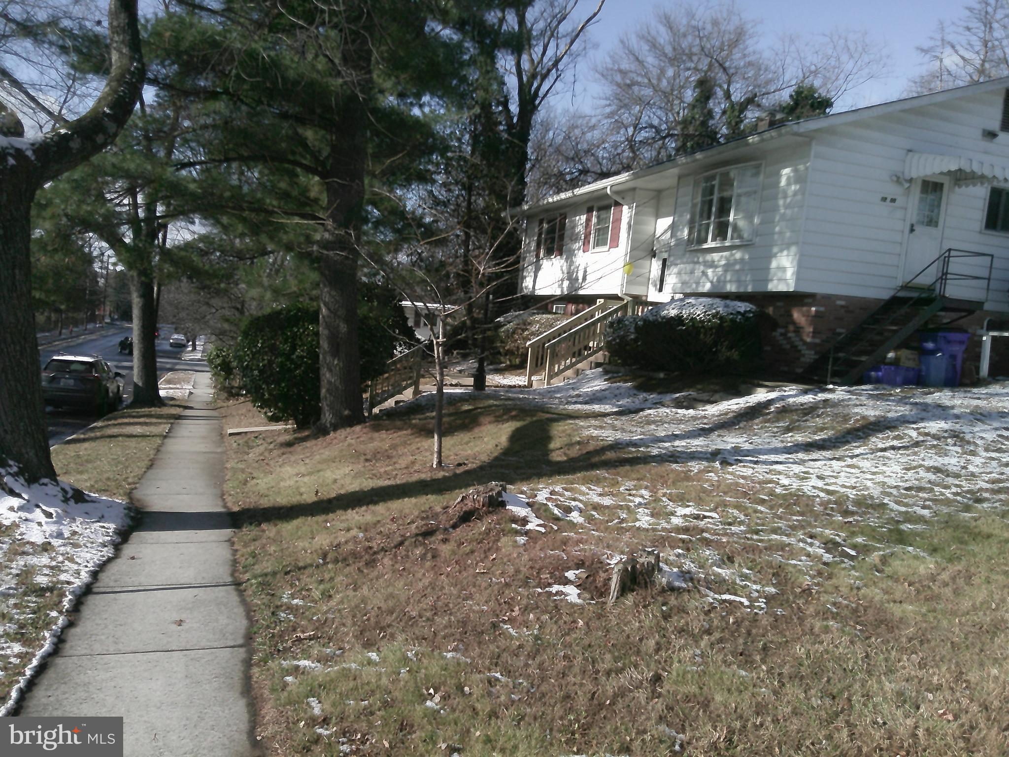 12300 Downer Drive Silver Spring, MD 20906 - Photo 7 of 53 a view of a house with a yard