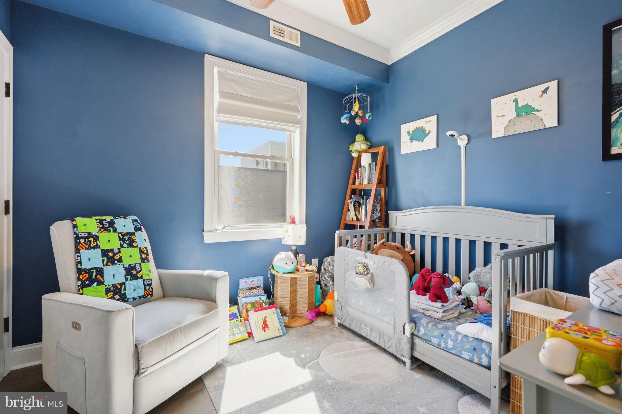 255 Ripka Street Philadelphia, PA 19127 - Photo 42 of 73 Cozy blue nursery for little dreams.