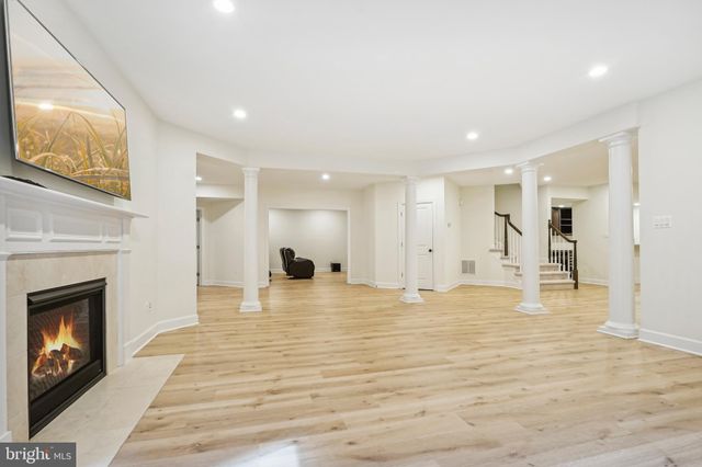 a kitchen with a sink and a stove