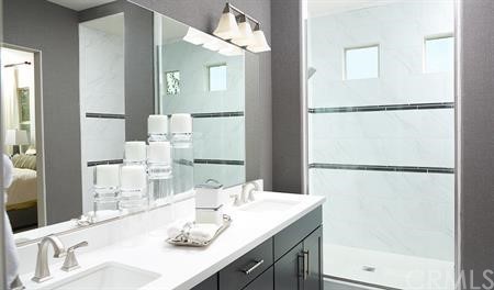 32511 Parker Street Menifee, CA 92584 - Photo 6 of 6 a bathroom with a sink and mirror