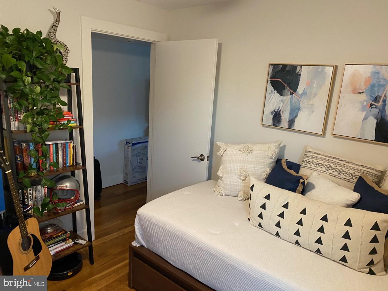 205 Witherspoon Street, Unit 4 Princeton, NJ 08542 - Photo 6 of 11 a bedroom with a bed and a night stand