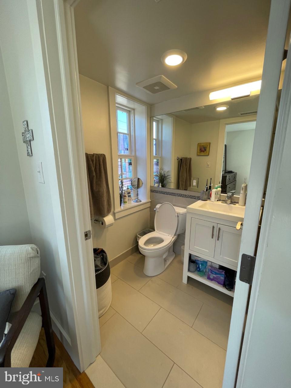 205 Witherspoon Street, Unit 4 Princeton, NJ 08542 - Photo 10 of 11 a bathroom with a sink a toilet a mirror and bathtub