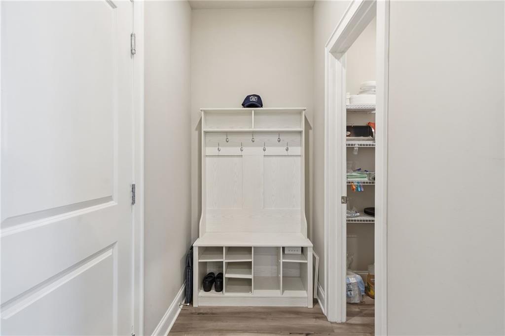 515 Cobblestone Circle Canton, GA 30115 - Photo 15 of 45 a view of dining room with wooden floor