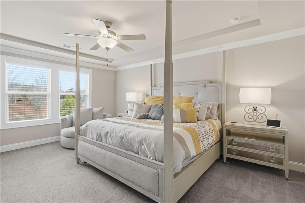 515 Cobblestone Circle Canton, GA 30115 - Photo 20 of 45 a bedroom with bed and a large window