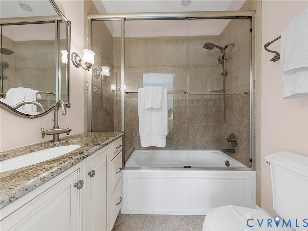 13612 Waterswatch Court Midlothian, VA 23113 - Photo 51 of 88 a bathroom with a granite countertop sink toilet and shower