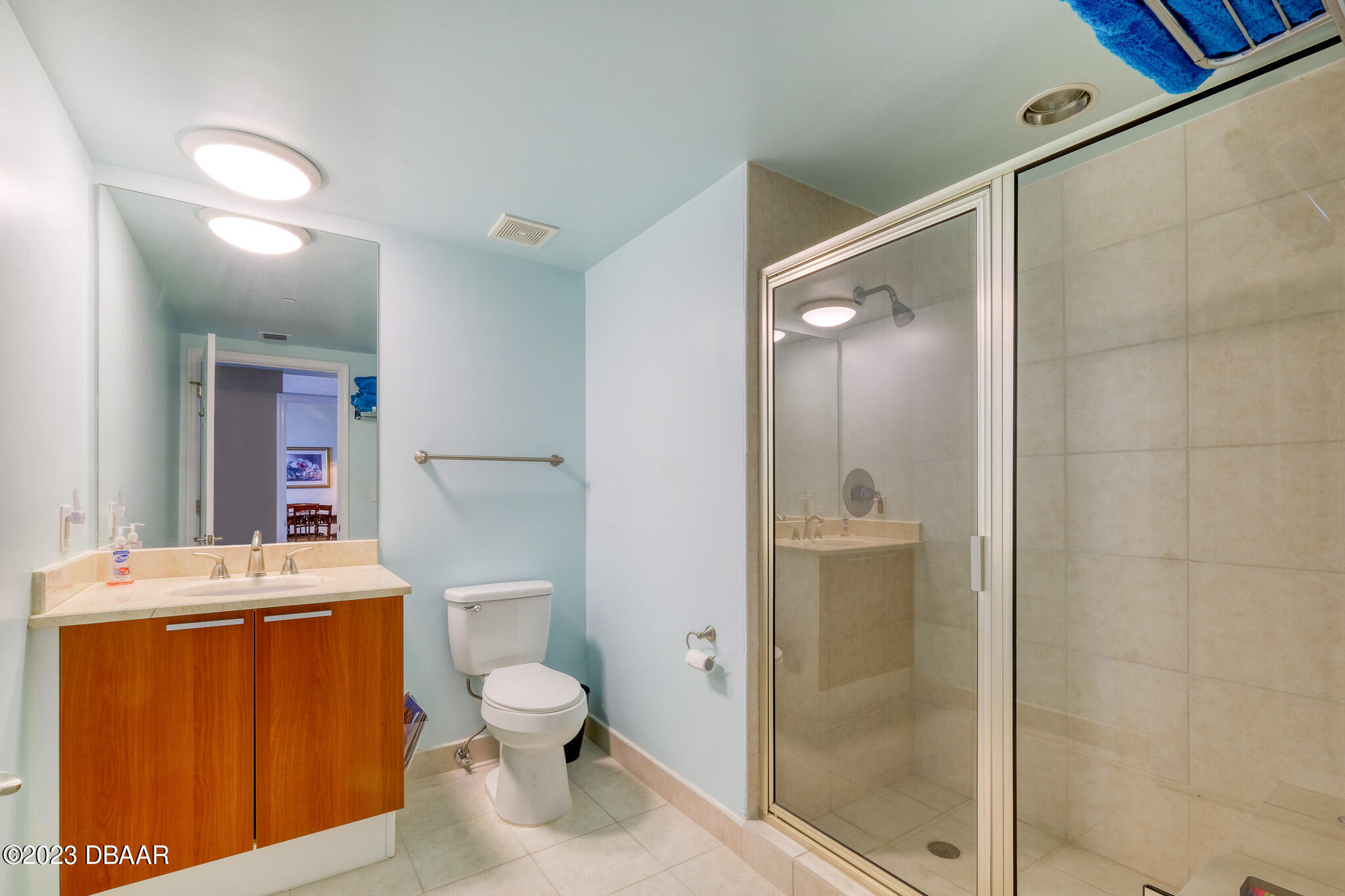 241 Riverside Drive, Unit 808 Holly Hill, FL 32117 - Photo 26 of 41 a bathroom with a sink a toilet and shower