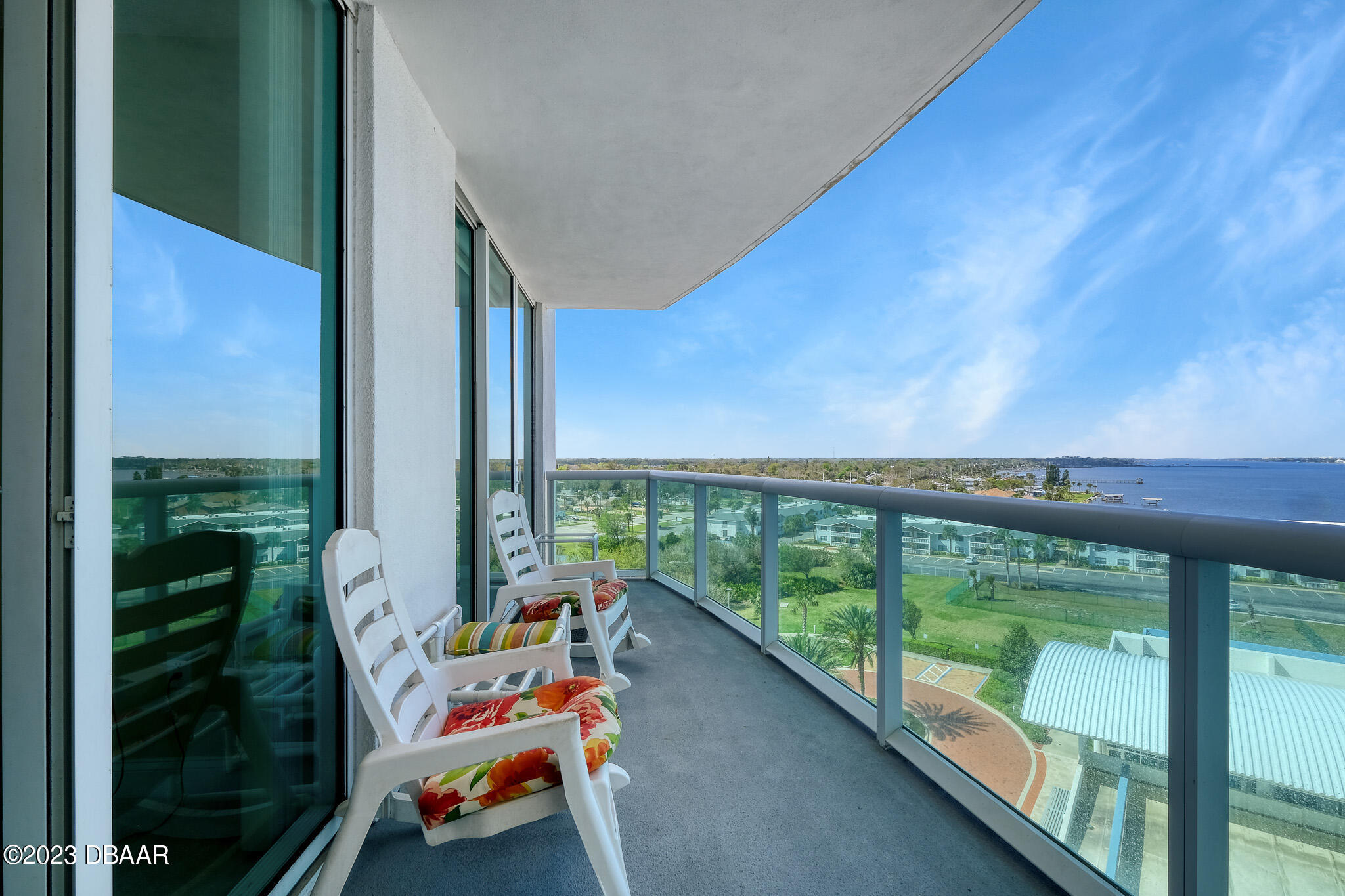 241 Riverside Drive, Unit 808 Holly Hill, FL 32117 - Photo 31 of 41 a balcony with furniture and city view