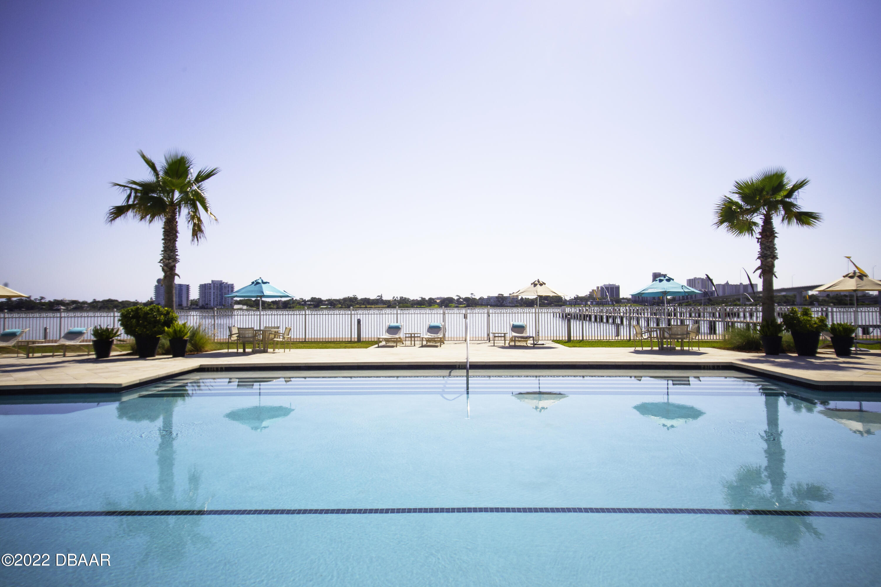 241 Riverside Drive, Unit 808 Holly Hill, FL 32117 - Photo 40 of 41 a view of a swimming pool with a terrace