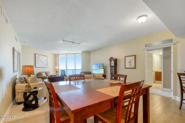 a view of a dining room with furniture