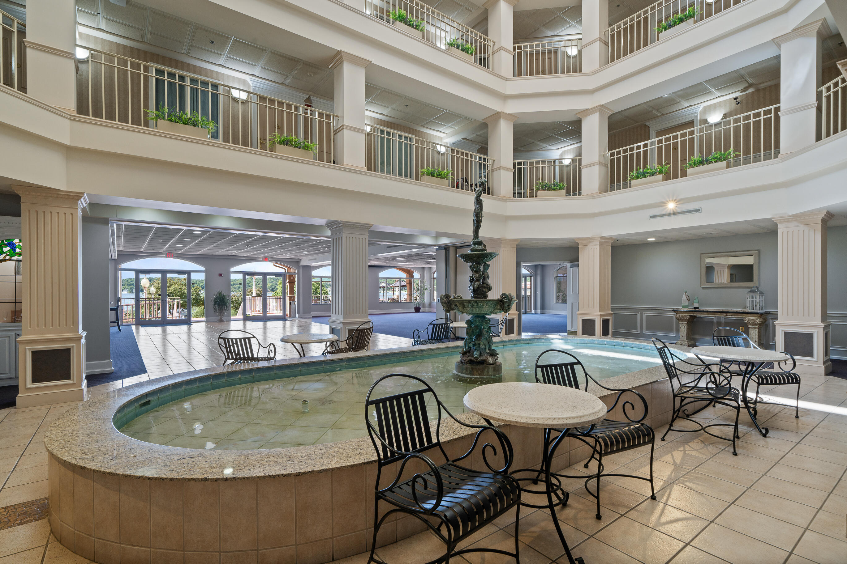 335 Wrigley Drive, Unit 308 Lake Geneva, WI 53147 - Photo 17 of 49 Hotel Atrium Lobby and Fountain