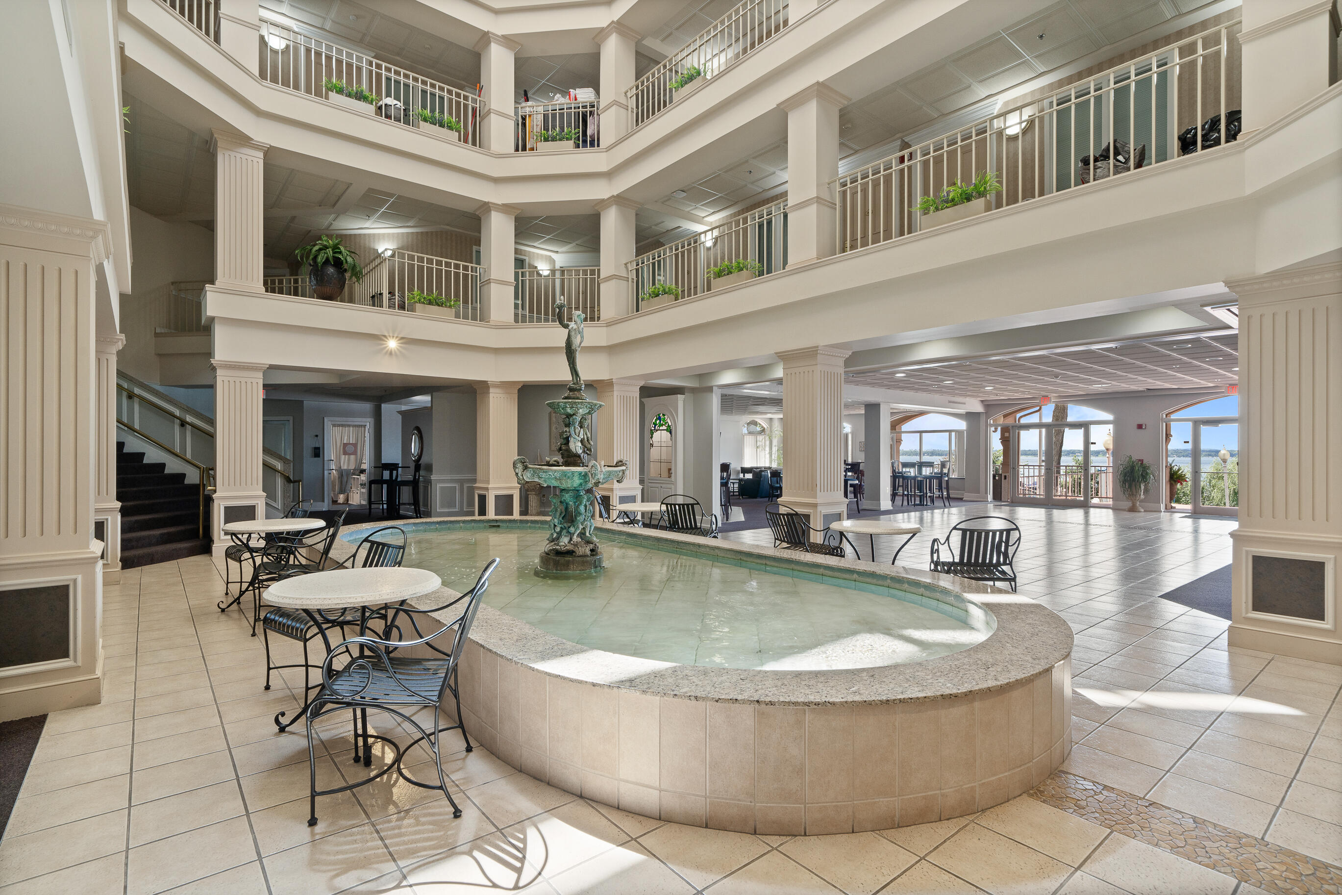 335 Wrigley Drive, Unit 308 Lake Geneva, WI 53147 - Photo 19 of 49 Hotel Atrium Lobby and Fountain