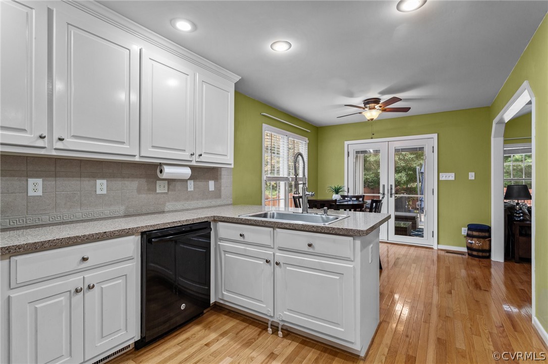 9437 Dunroming Road Chesterfield, VA 23832 - Photo 16 of 40 a kitchen with cabinets a sink and appliances
