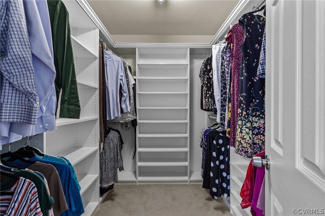 9437 Dunroming Road Chesterfield, VA 23832 - Photo 28 of 40 a view of walk in closet with clothes and shoes