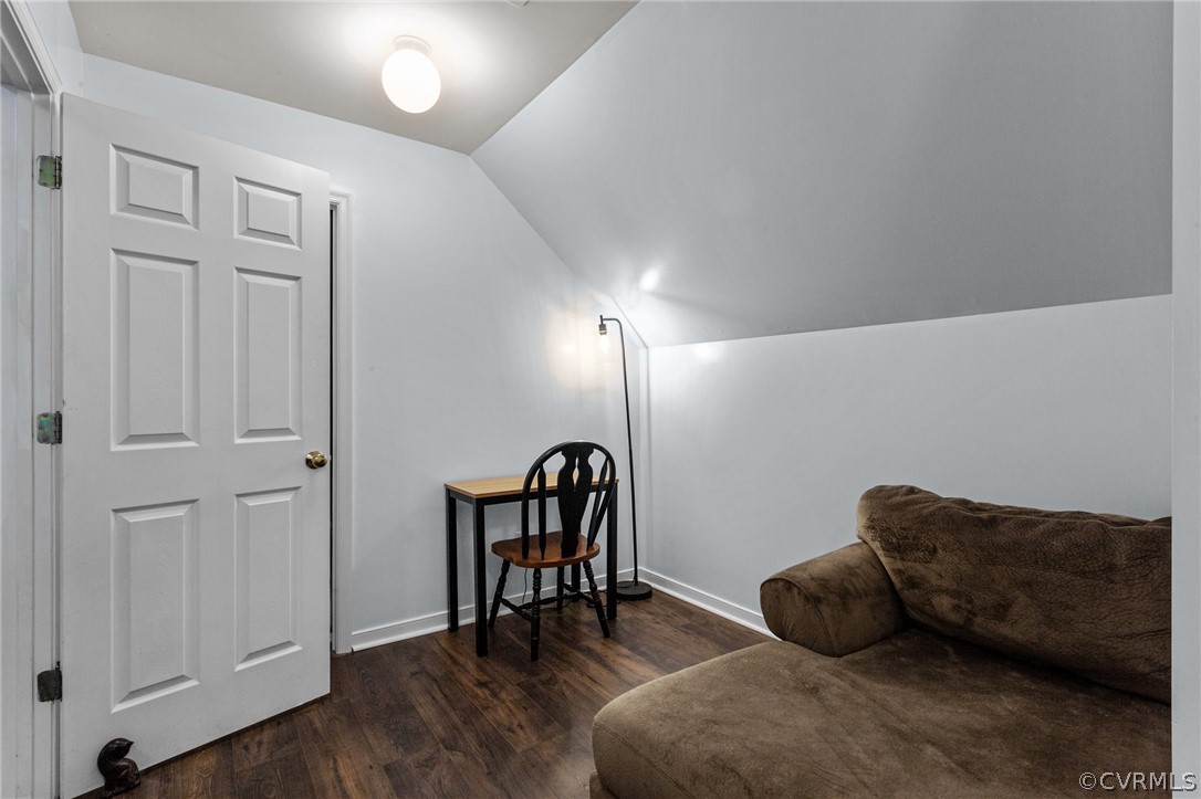 9437 Dunroming Road Chesterfield, VA 23832 - Photo 31 of 40 a living room with furniture and a wooden floor