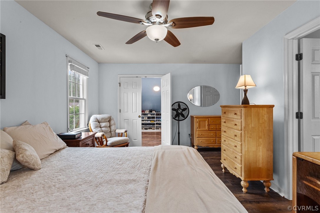 9437 Dunroming Road Chesterfield, VA 23832 - Photo 33 of 40 a bedroom with bed and wooden floor