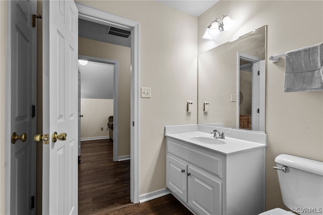 9437 Dunroming Road Chesterfield, VA 23832 - Photo 35 of 40 a bathroom with a sink and a mirror