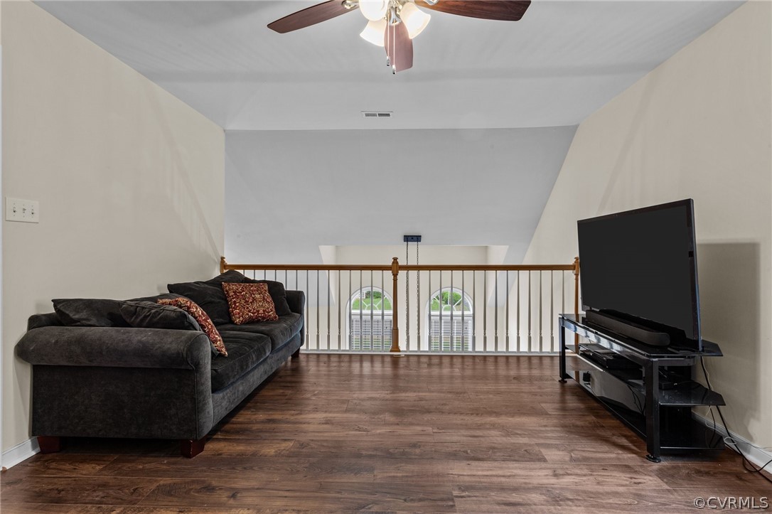 9437 Dunroming Road Chesterfield, VA 23832 - Photo 39 of 40 a living room with furniture and a flat screen tv