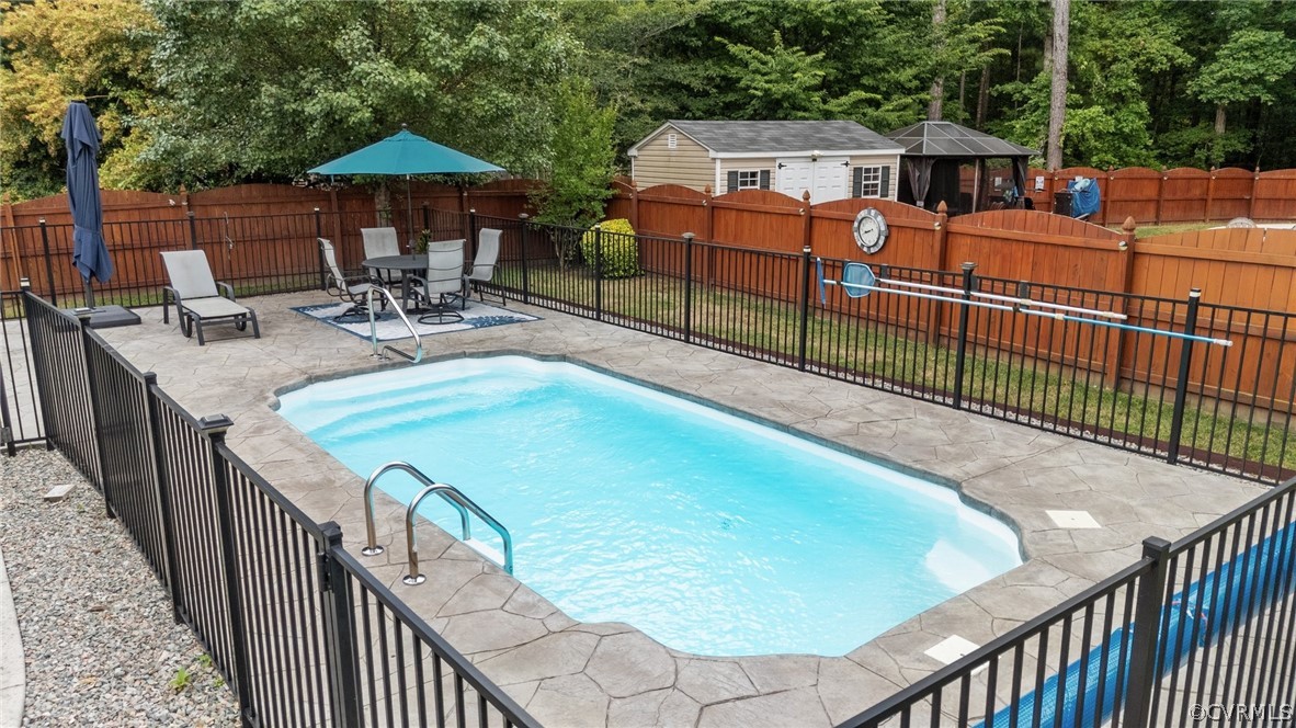 9437 Dunroming Road Chesterfield, VA 23832 - Photo 5 of 40 swimming pool view with a seating space