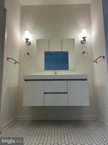 a view of a sink and a mirror