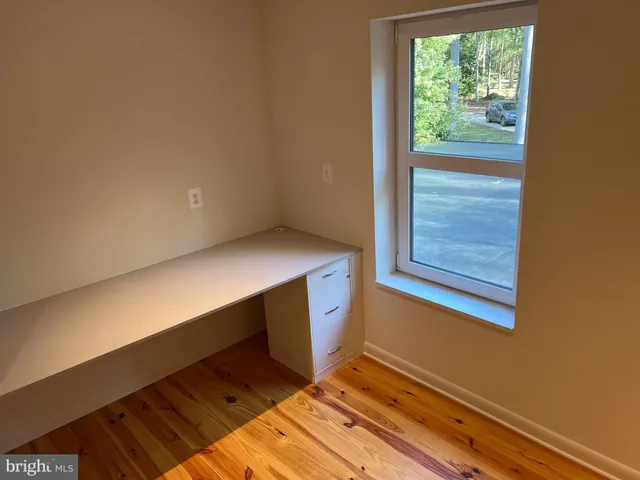a view of an empty room and window