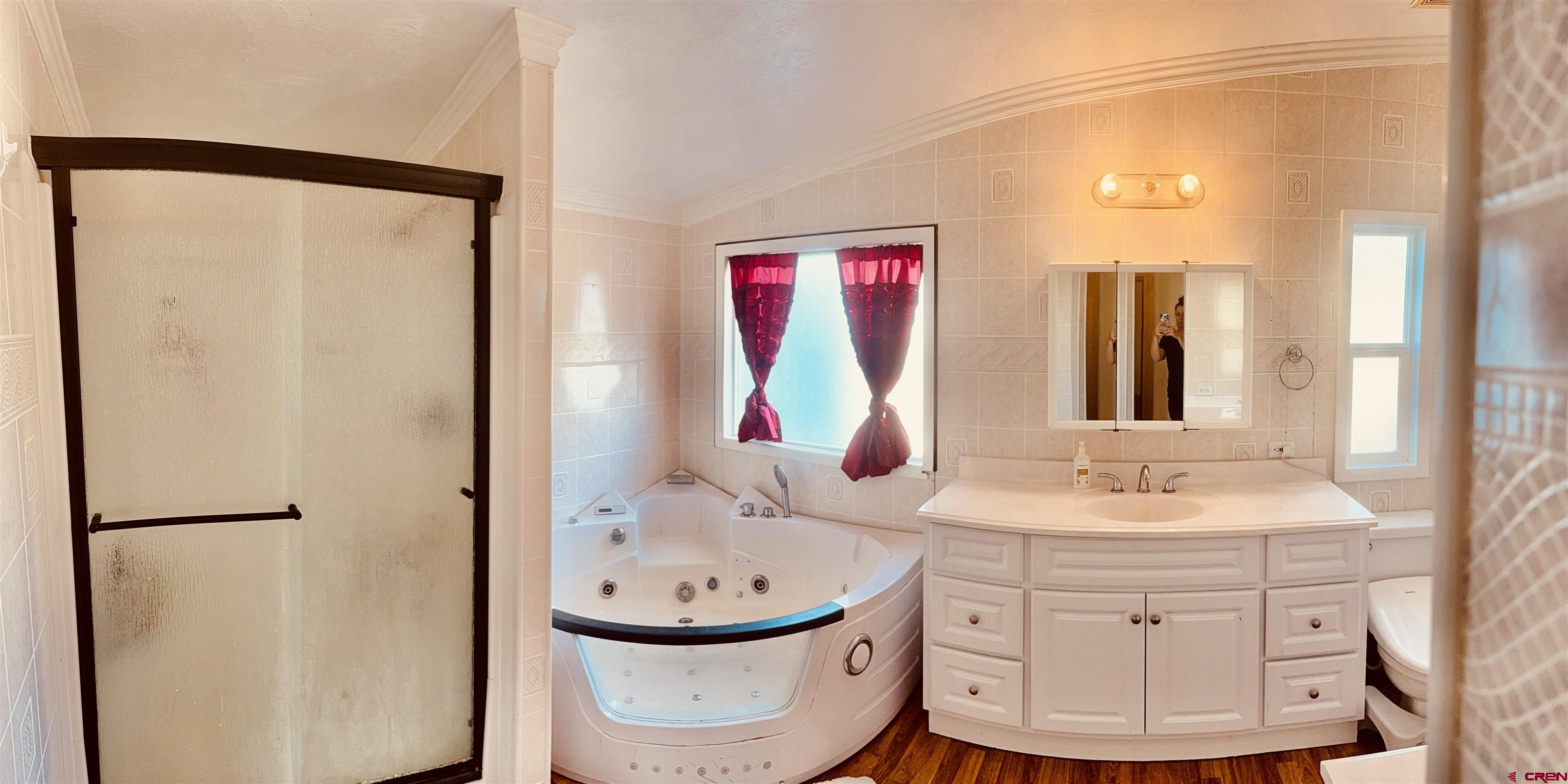 23825 Rd F.4 Cortez, CO 81321 - Photo 7 of 18 a bathroom with a sink toilet and shower