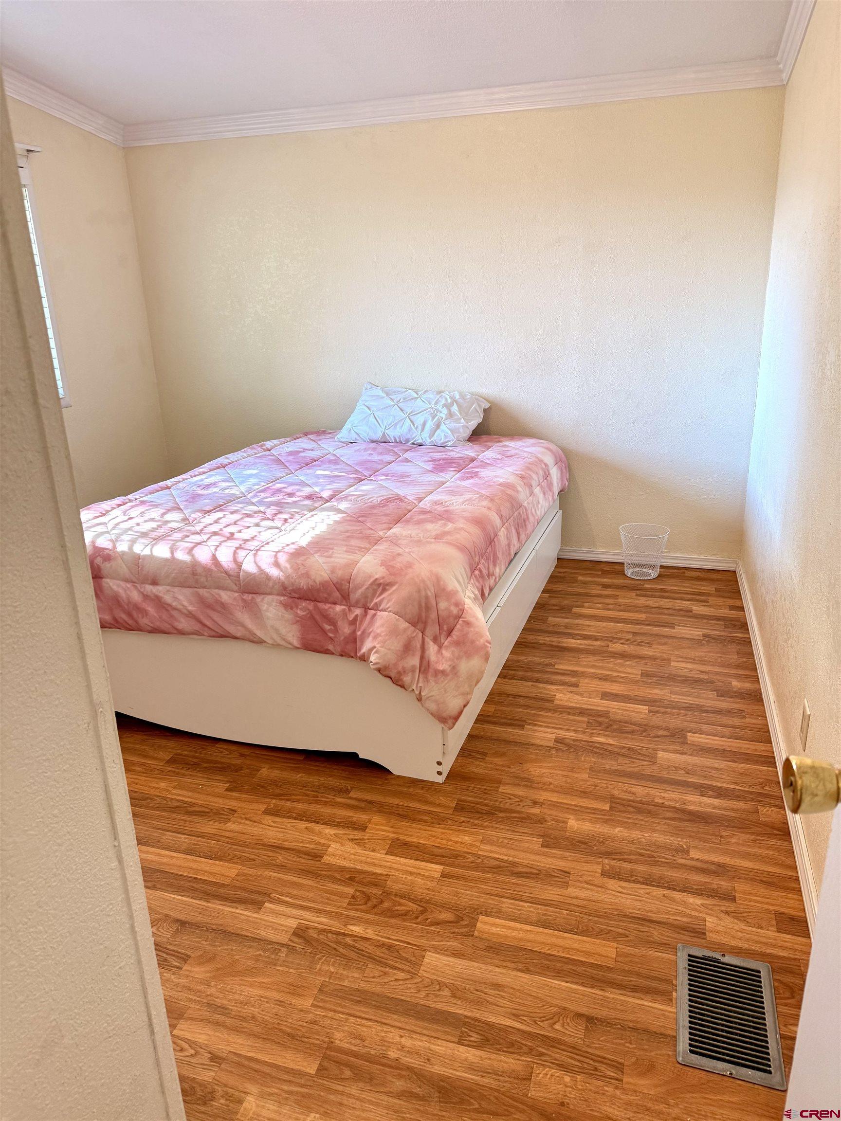 23825 Rd F.4 Cortez, CO 81321 - Photo 8 of 18 a bedroom with a bed and a rug