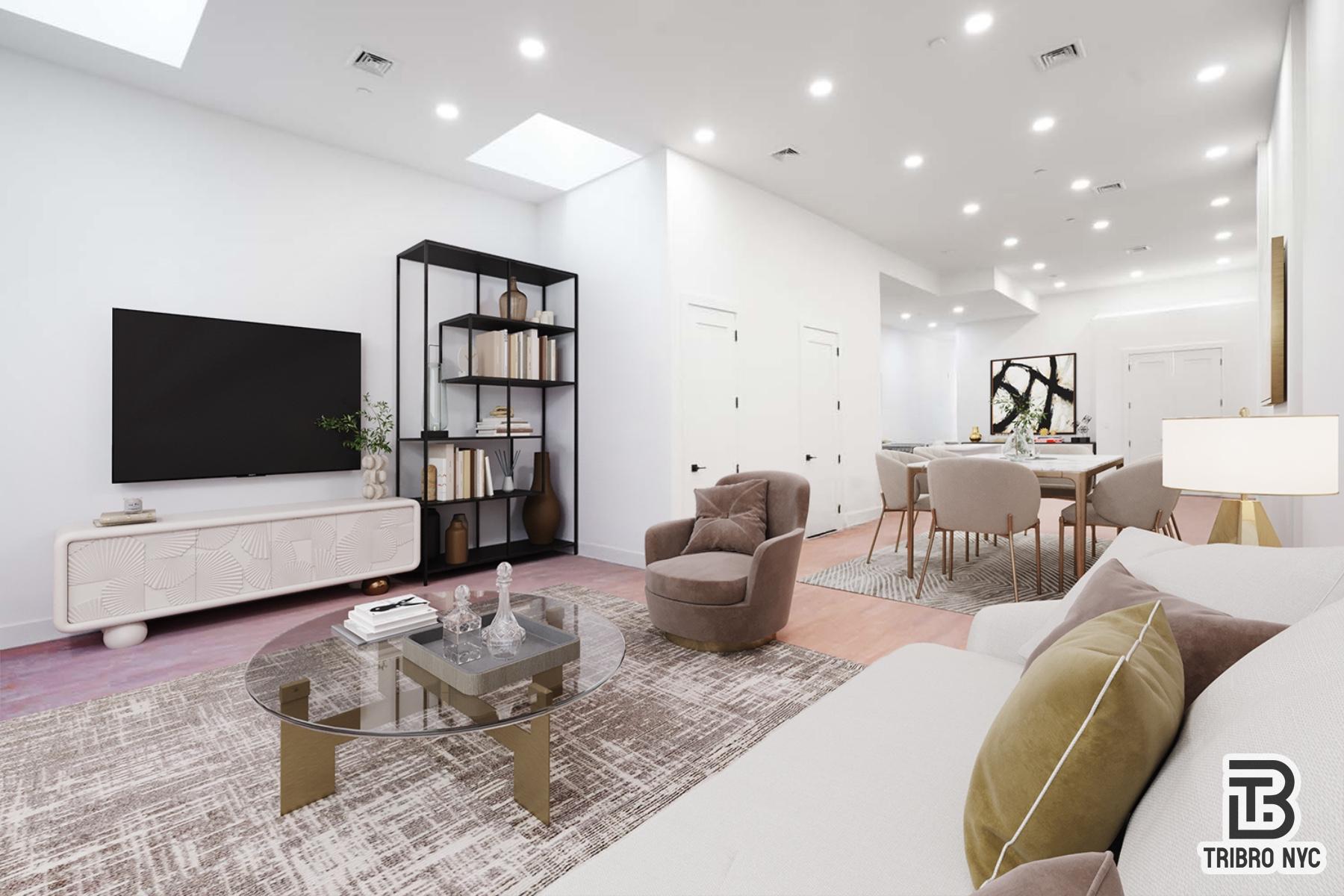 217 South 4th Street, Unit LOFT1 Brooklyn, NY 11211 - Photo 1 of 12 a living room with furniture and a flat screen tv