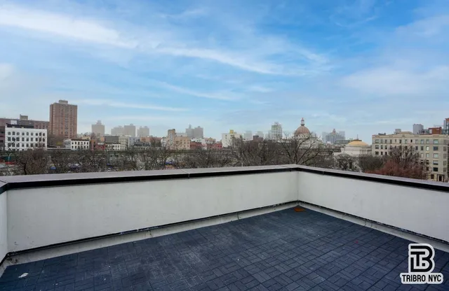 a view of a city skyline from a terrace