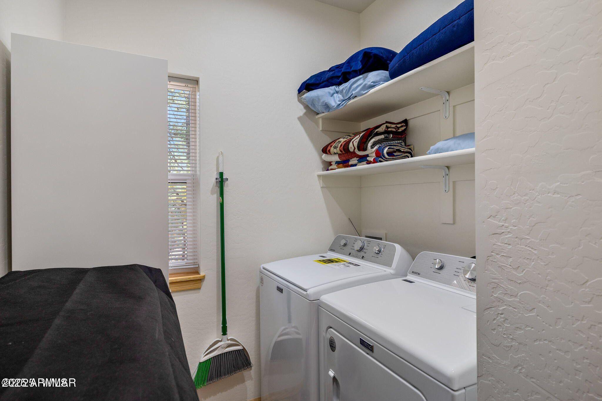 26 County Road 2067 Alpine, AZ 85920 - Photo 17 of 33 a utility room with dryer and washer