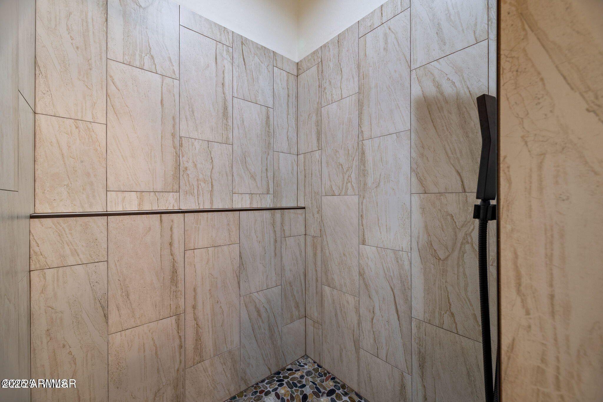 26 County Road 2067 Alpine, AZ 85920 - Photo 19 of 33 a bathroom with a shower and a curtain