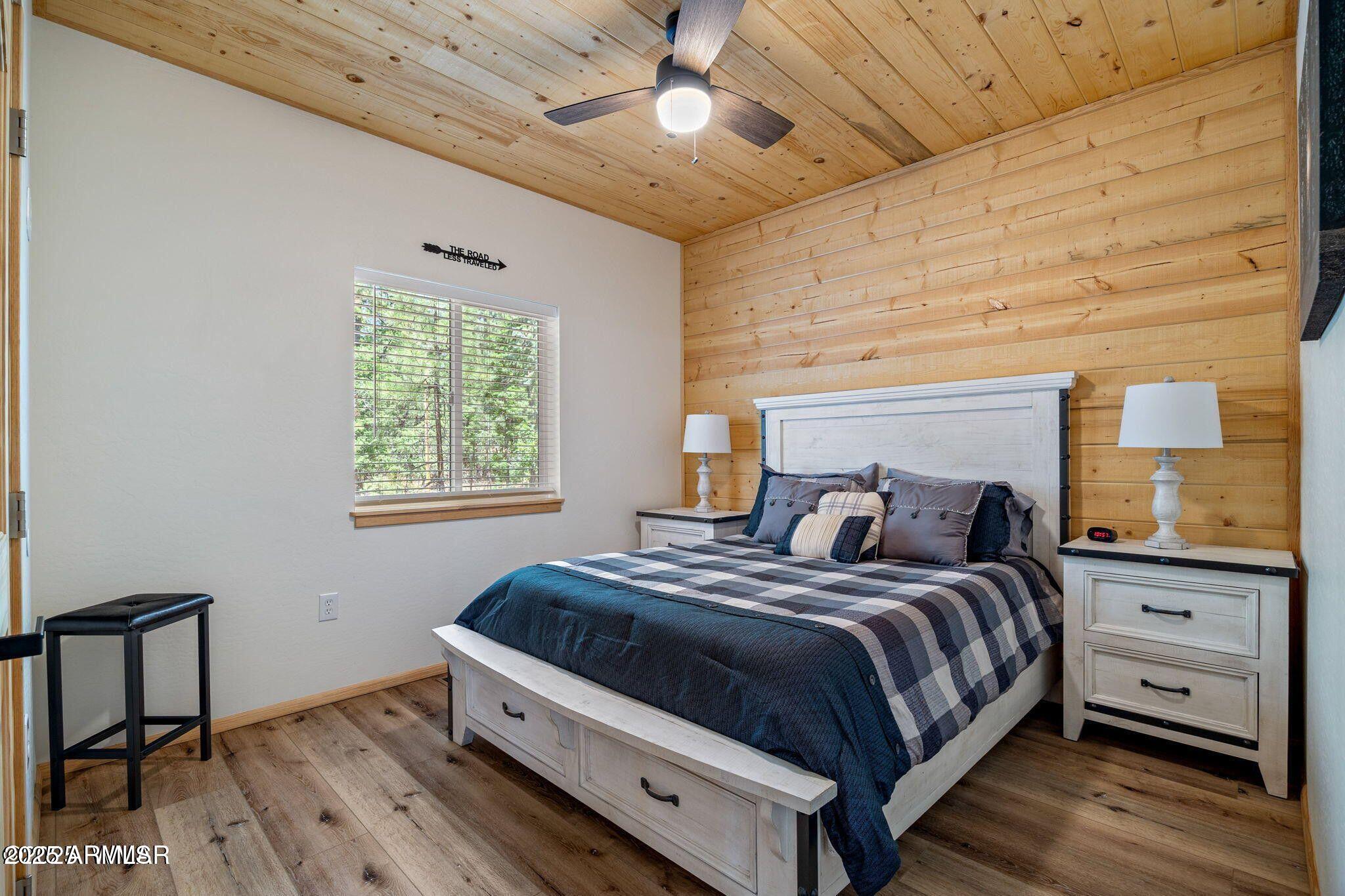 26 County Road 2067 Alpine, AZ 85920 - Photo 21 of 33 a bedroom with a bed and a window
