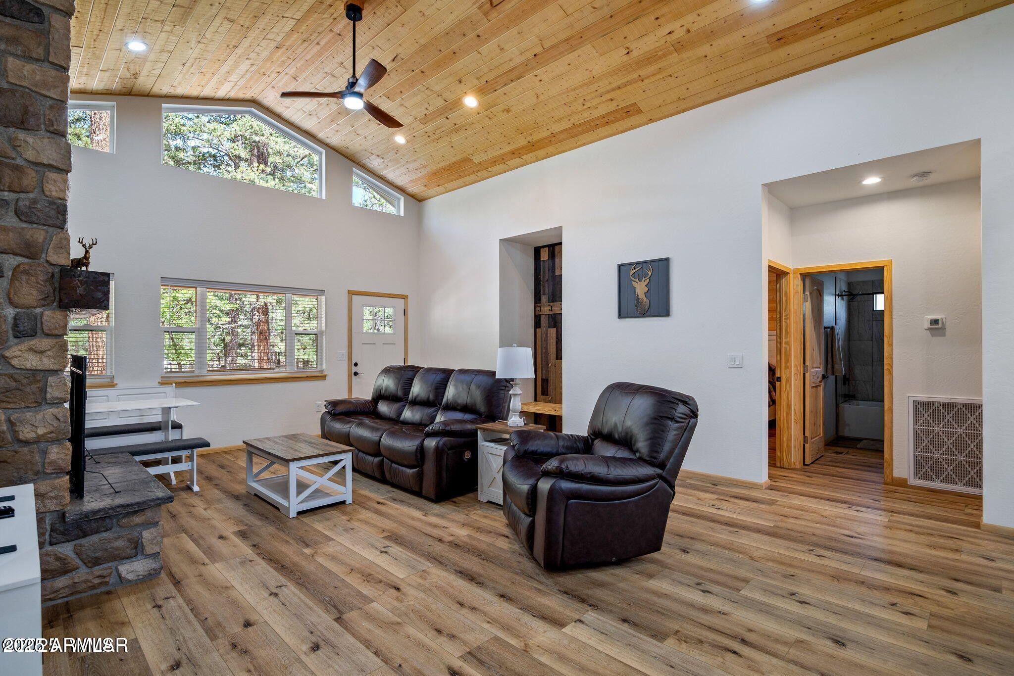26 County Road 2067 Alpine, AZ 85920 - Photo 4 of 33 a living room with furniture windows and a flat screen tv