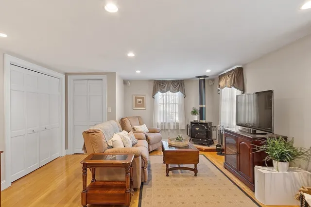 a view of a backyard with large trees
