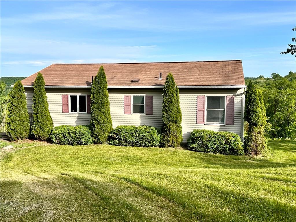 241 Countryview Road Slippery Rock, PA 16057 - Photo 1 of 24 front view of a house with a yard