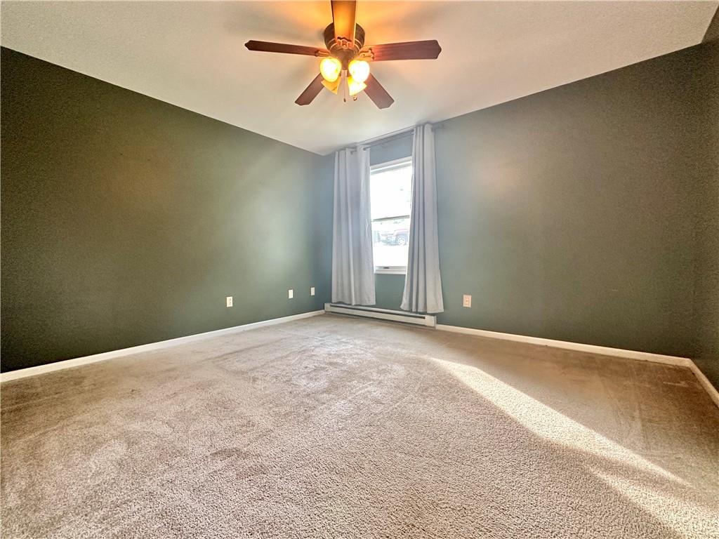 241 Countryview Road Slippery Rock, PA 16057 - Photo 7 of 24 an empty room with windows and fan