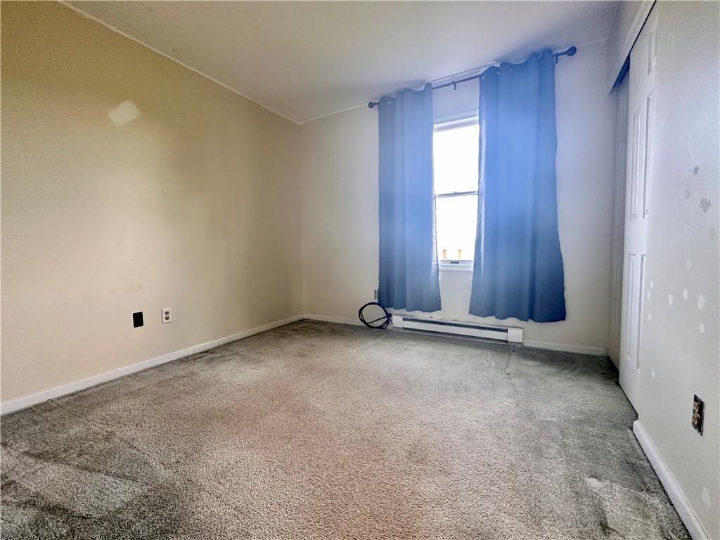 241 Countryview Road Slippery Rock, PA 16057 - Photo 8 of 24 an empty room with windows