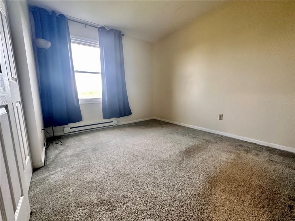 241 Countryview Road Slippery Rock, PA 16057 - Photo 9 of 24 an empty room with windows