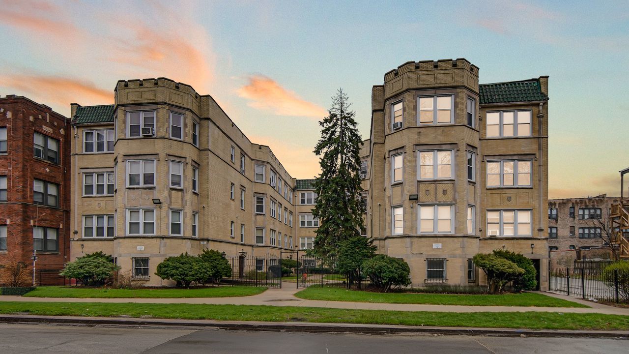 7017 South Merrill Avenue, Unit 305 Chicago, IL 60649 - Photo 2 of 20 a front view of a building