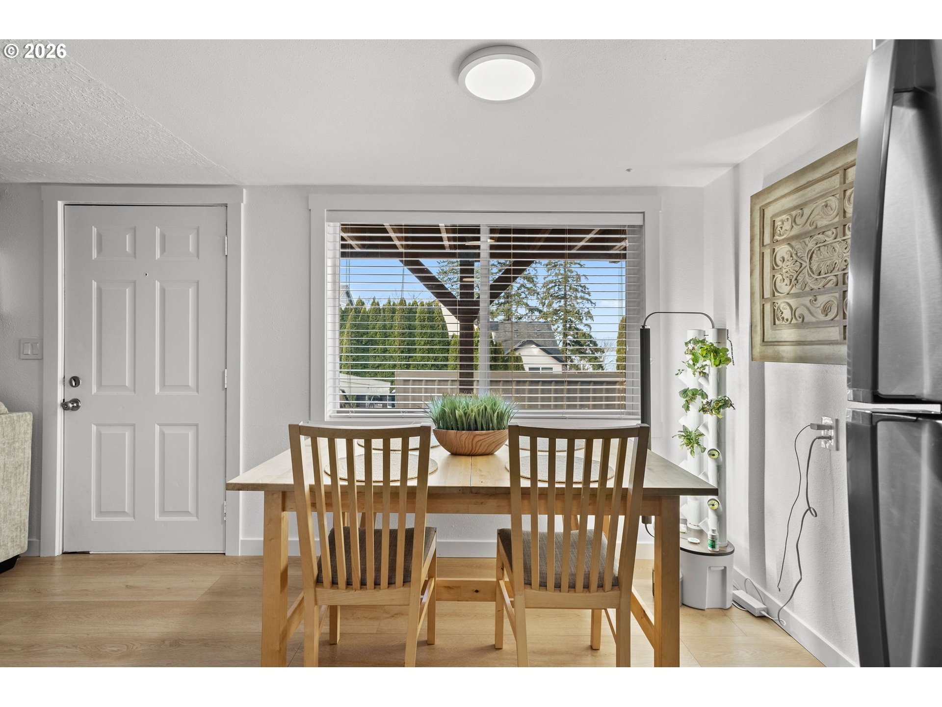 2102 Kelly Road, Unit 9 Vancouver, WA 98665 - Photo 6 of 29 a view of a dining room with furniture window and outside view