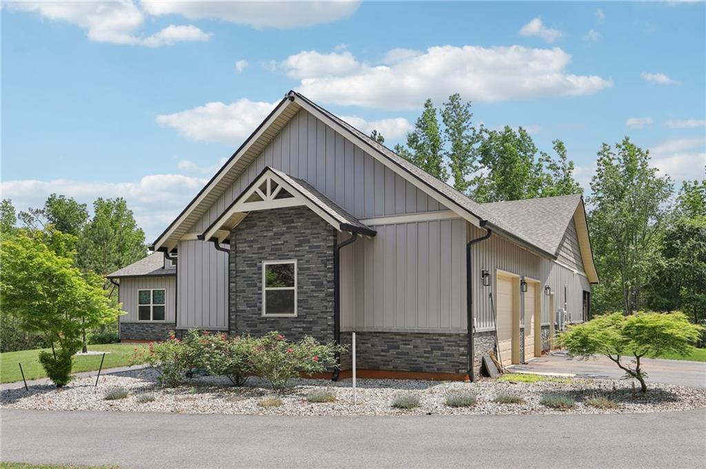 411 Johnson Road Locust Grove, GA 30248 - Photo 2 of 54 a view of house with street