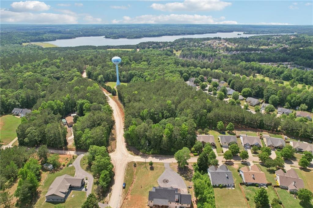411 Johnson Road Locust Grove, GA 30248 - Photo 47 of 54 an aerial view of multiple house