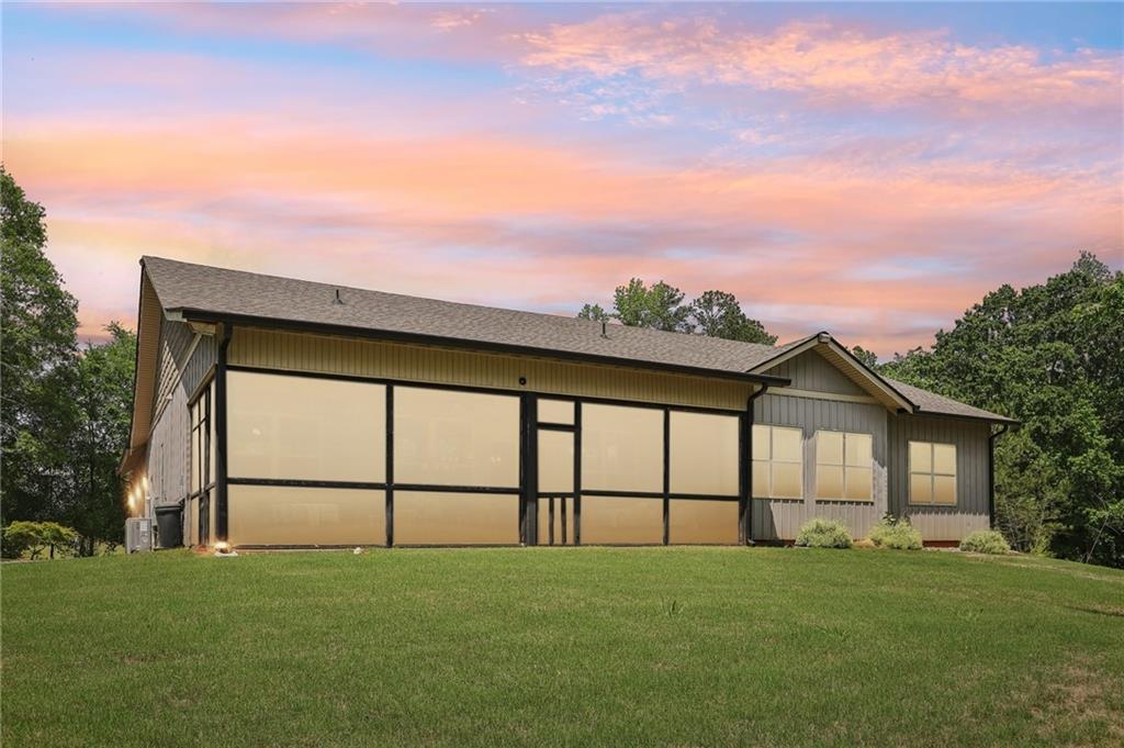 411 Johnson Road Locust Grove, GA 30248 - Photo 53 of 54 a front view of a house with a yard