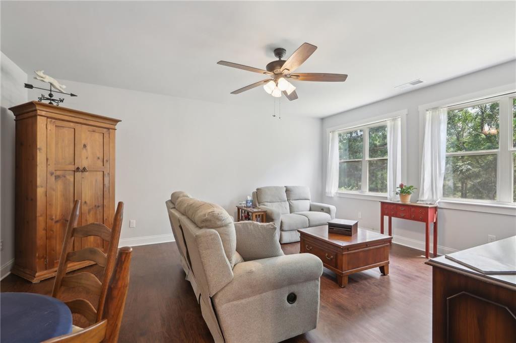 411 Johnson Road Locust Grove, GA 30248 - Photo 9 of 54 a dining room with furniture and window